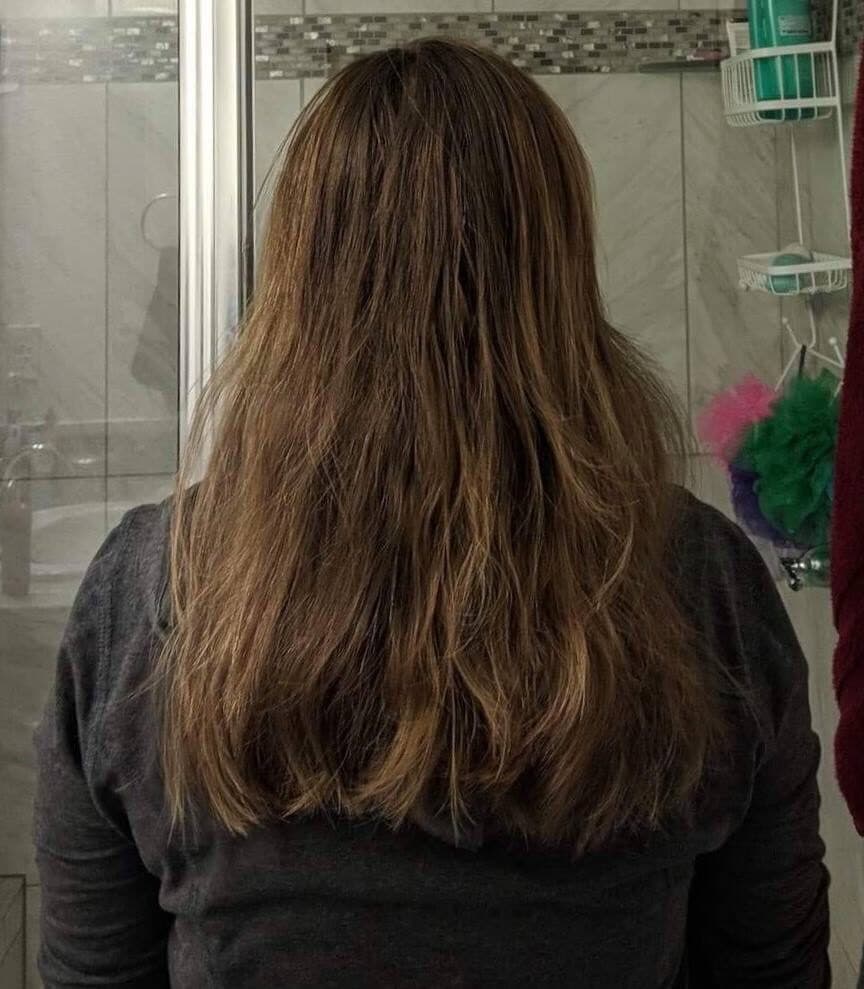 Long layered brunette with subtle highlights